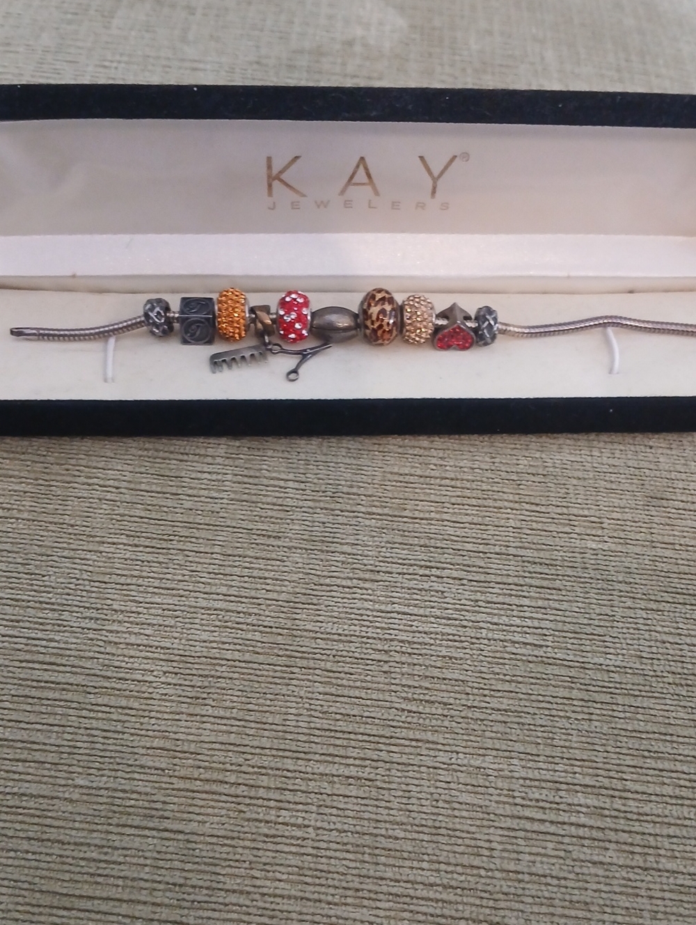 Kay Jewelers Silver Bracelet with Red and Gold Charms